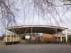 Curved roof steel building school court shelter with safety padded posts - Melbourne, VIC