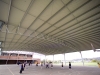 Curved roof steel building over school sports court - Melbourne, Victoria